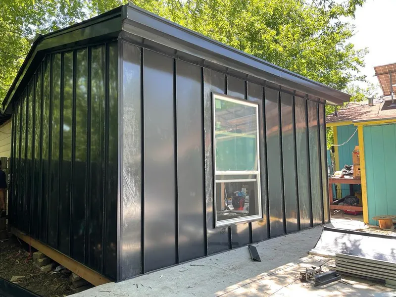 Black standing seam metal wall panels for Roof Inspection in Montclair