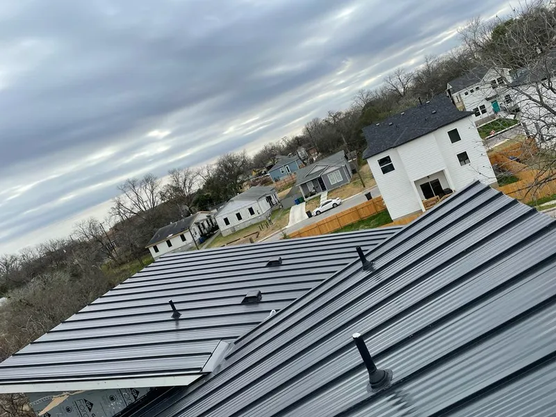 Standing seam metal roof panels with vents for Skylight Repair in Montclair